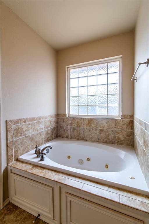 bathroom featuring a whirlpool tub