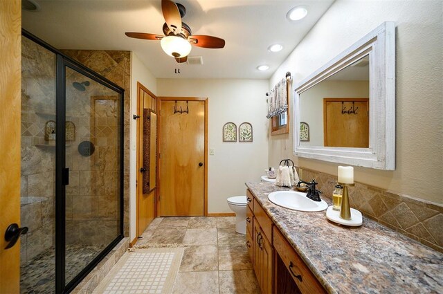 full bath featuring recessed lighting, visible vents, toilet, a stall shower, and vanity