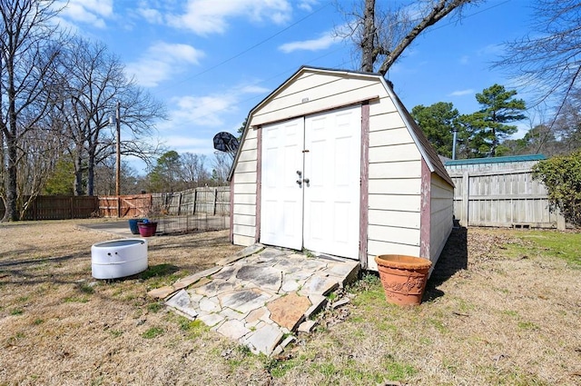 view of shed featuring a fenced backyard