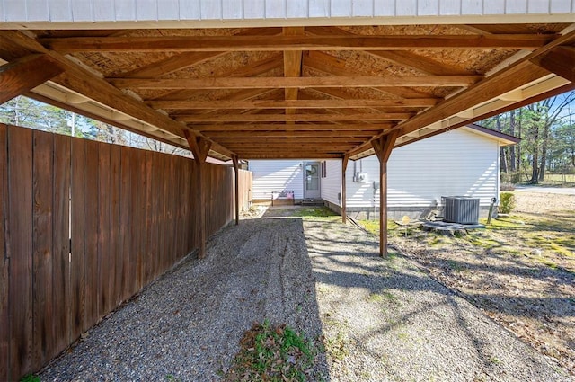 view of patio featuring fence and central AC