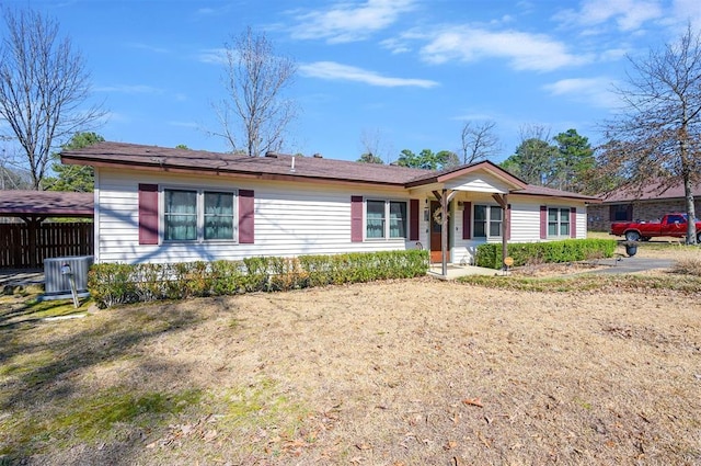 ranch-style house with central AC unit