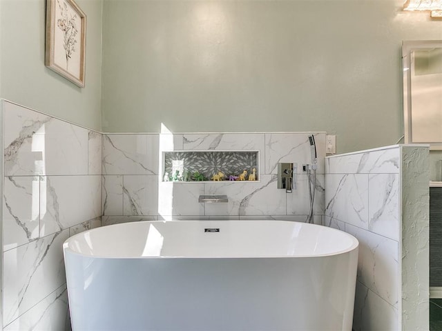 bathroom with a soaking tub