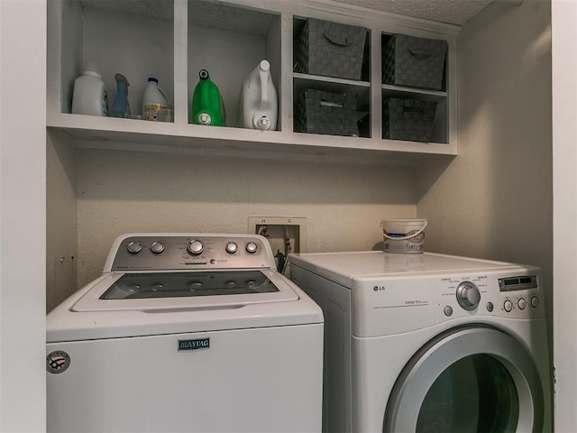 washroom with laundry area and separate washer and dryer