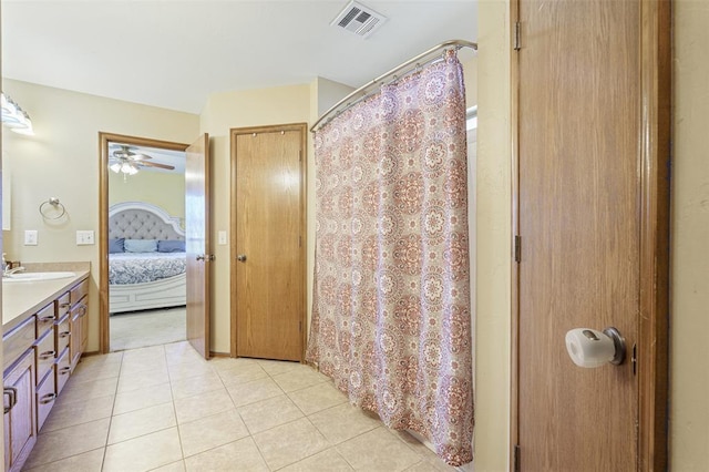 ensuite bathroom with tile patterned floors, visible vents, ensuite bath, a shower with shower curtain, and vanity