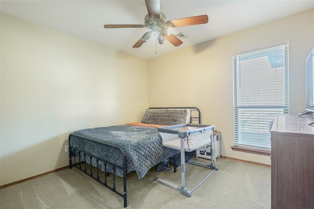 bedroom featuring visible vents, ceiling fan, baseboards, and carpet floors