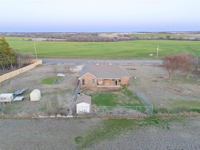 birds eye view of property featuring a rural view