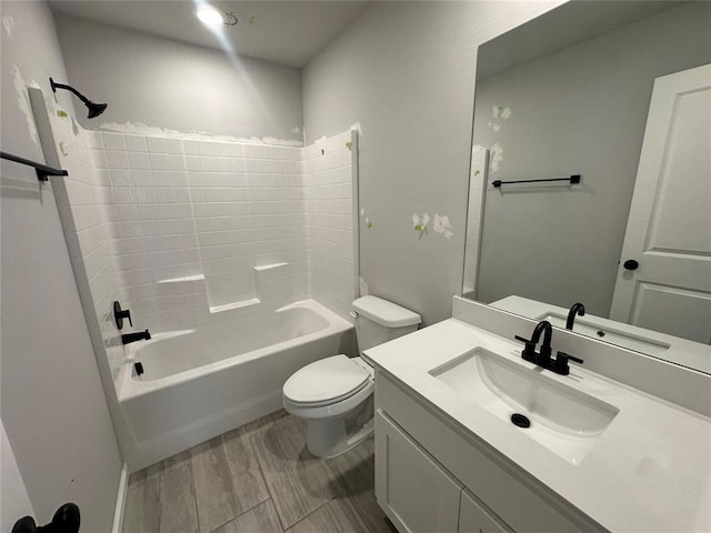 full bath with vanity, toilet, and shower / bathtub combination