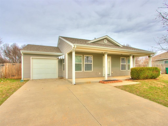 ranch-style house featuring an attached garage, covered porch, fence, concrete driveway, and roof with shingles