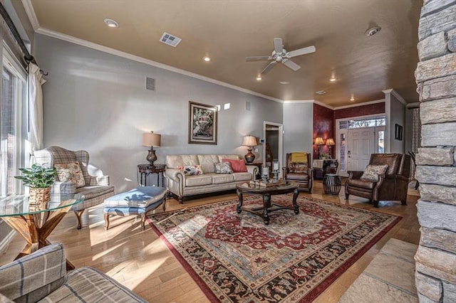 living area featuring a healthy amount of sunlight and visible vents