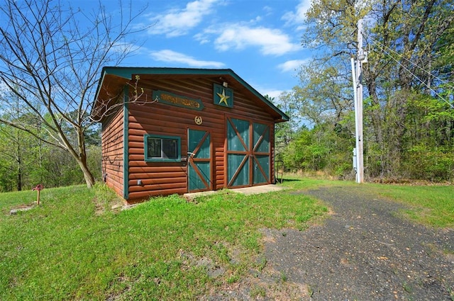 387 N Riverbend Rd, Smithville, OK 74957 - view of outdoor structure featuring an outdoor structure