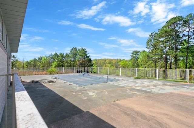387 N Riverbend Rd, Smithville, OK 74957 - view of basketball court with fence