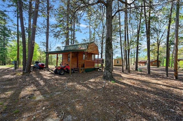 387 N Riverbend Rd, Smithville, OK 74957 - view of yard featuring a wooden deck