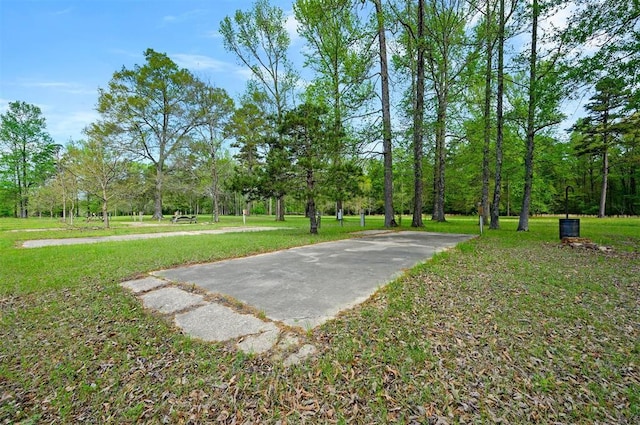 387 N Riverbend Rd, Smithville, OK 74957 - view of community with a yard
