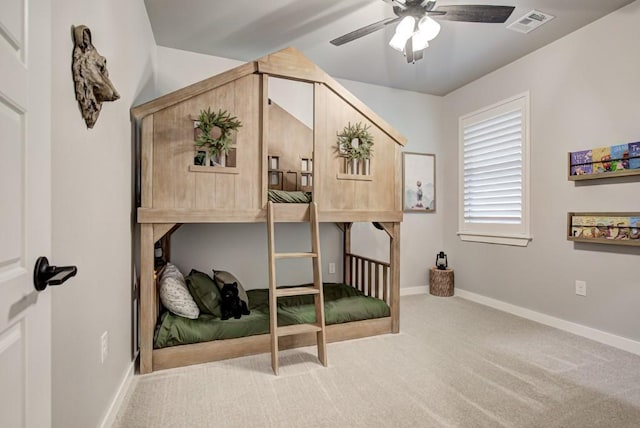 bedroom featuring carpet floors, visible vents, and baseboards