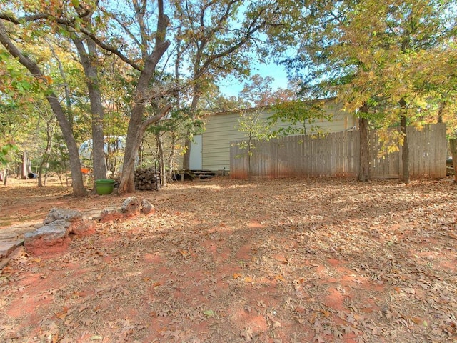 view of yard with fence