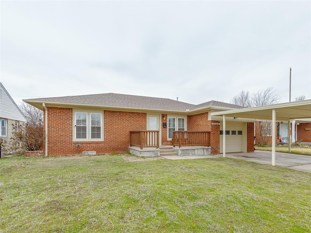 single story home with an attached carport, concrete driveway, brick siding, and a front lawn