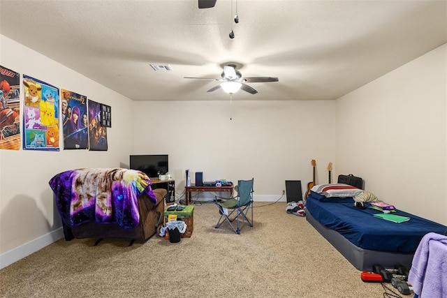 game room featuring baseboards, visible vents, ceiling fan, and carpet flooring