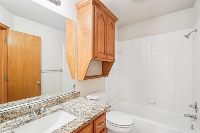 full bath featuring shower / bath combination, vanity, and toilet