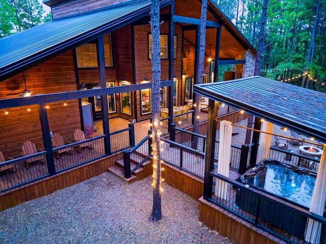 view of side of home with metal roof