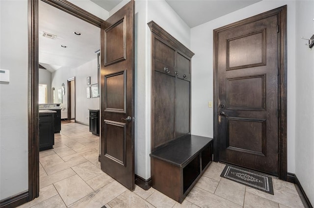 mudroom with visible vents and baseboards