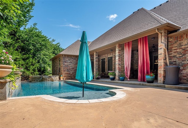 outdoor pool with a patio