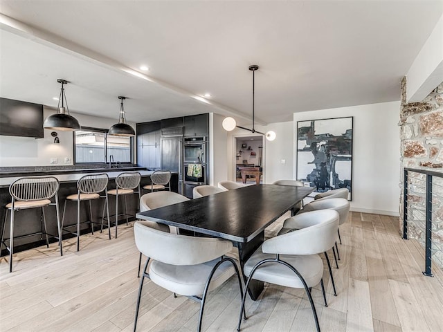 dining room featuring light wood-type flooring