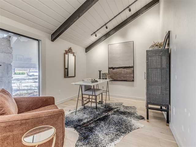 office area featuring light wood finished floors, baseboards, wood ceiling, lofted ceiling with beams, and rail lighting