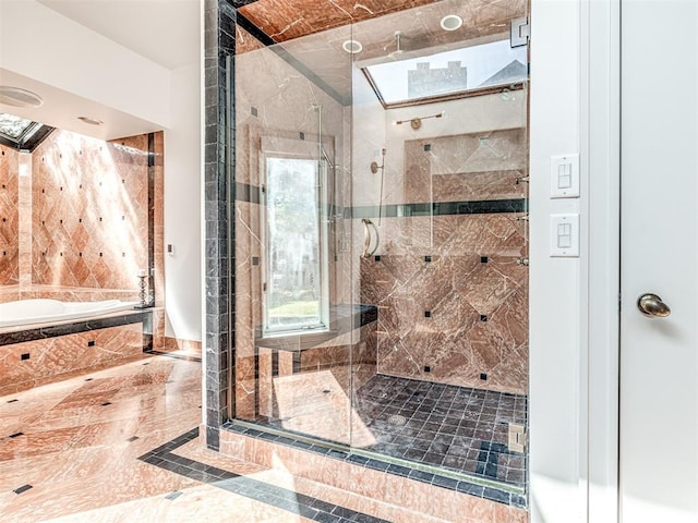 full bathroom with a garden tub and a stall shower