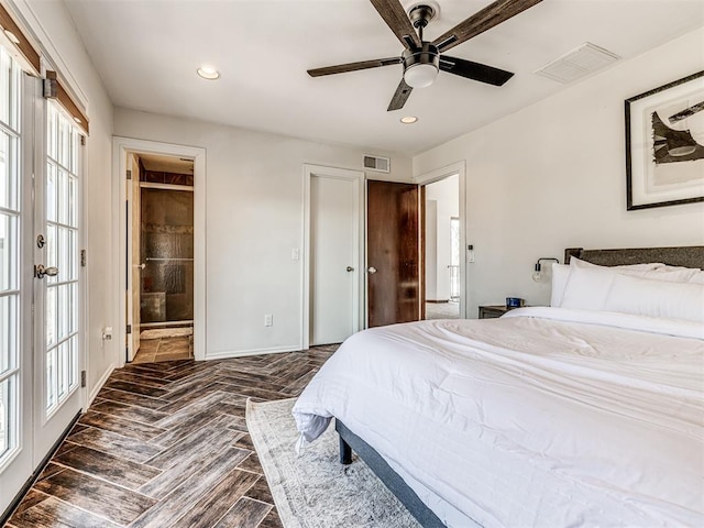 bedroom with recessed lighting, visible vents, and ensuite bath