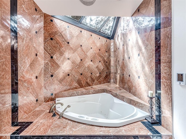 3108 Brush Creek Rd, Oklahoma City, OK 73120 - full bathroom with a bath, a skylight, and tile walls