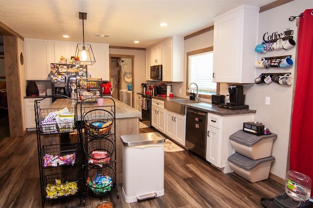 kitchen featuring black range with electric cooktop, dark wood-type flooring, a sink, visible vents, and dishwasher