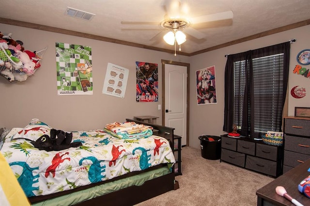 bedroom with a ceiling fan, visible vents, ornamental molding, and light carpet