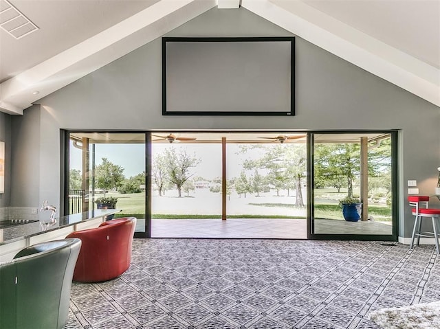 interior space with visible vents, high vaulted ceiling, and a wealth of natural light