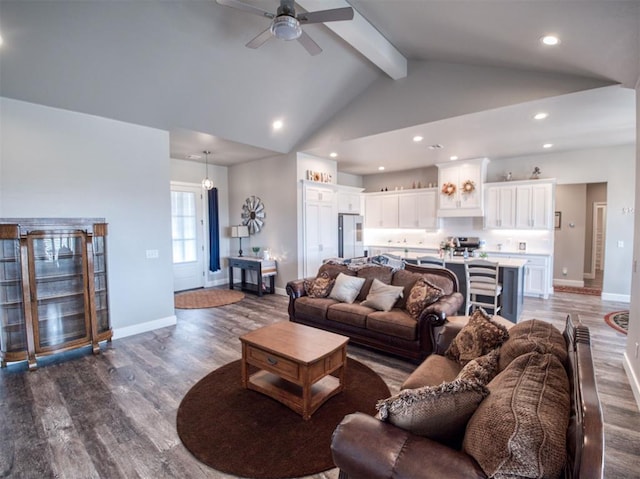 living room with baseboards, ceiling fan, beam ceiling, recessed lighting, and wood finished floors