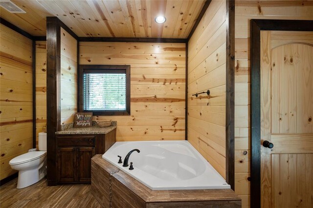 full bath featuring visible vents, a garden tub, toilet, wooden walls, and wood ceiling