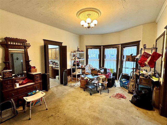 dining space featuring a textured ceiling, an inviting chandelier, carpet floors, and ornamental molding