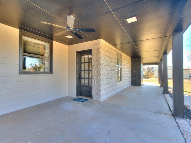 view of patio with ceiling fan