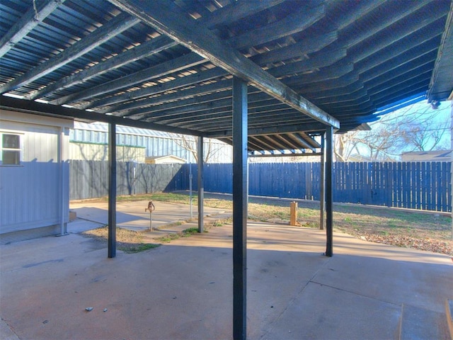 view of patio / terrace featuring fence