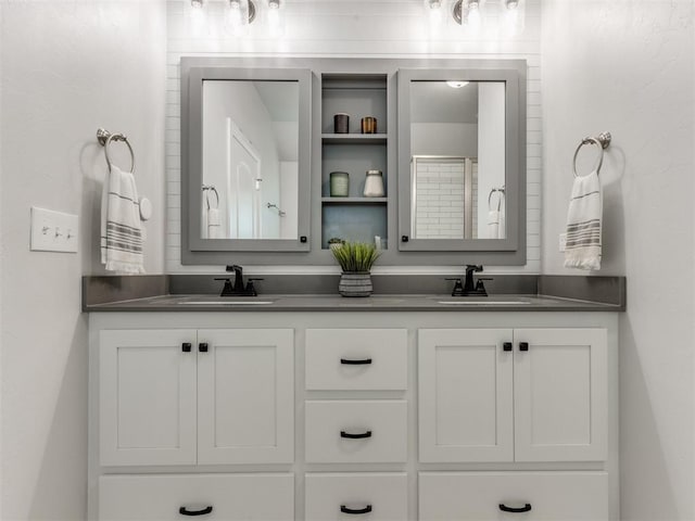 bathroom with double vanity and a sink