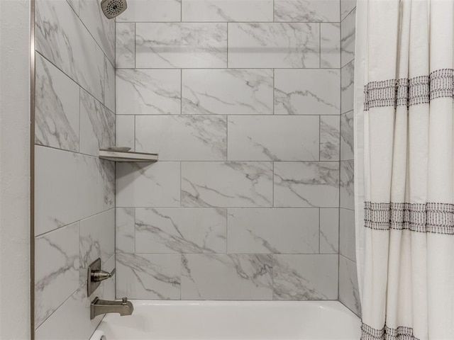 bathroom featuring shower / tub combo