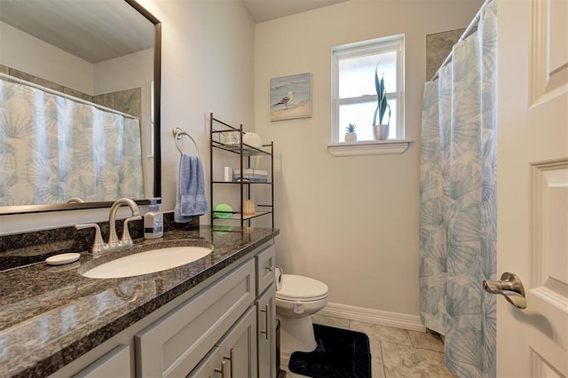 full bath with curtained shower, toilet, vanity, baseboards, and tile patterned floors