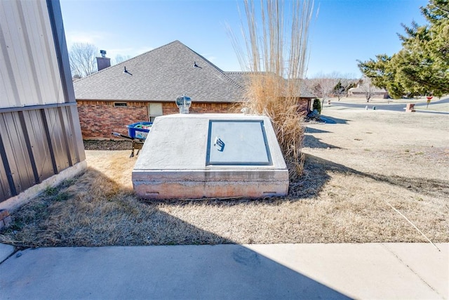 view of entry to storm shelter