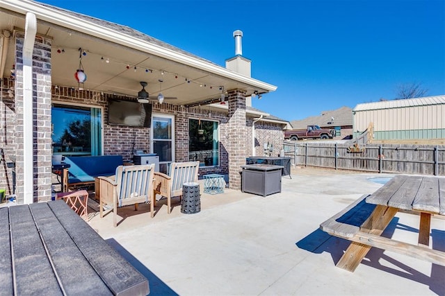 view of patio / terrace with fence