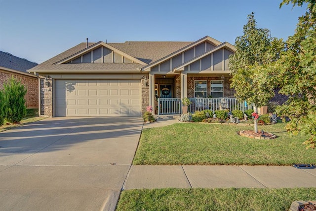 view of front of property featuring brick siding, board and batten siding, and an attached garage