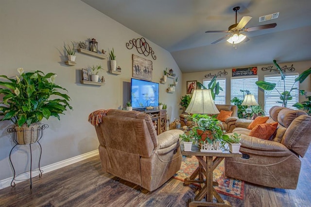 living area with lofted ceiling, ceiling fan, visible vents, and wood finished floors