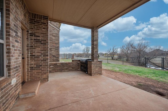 view of patio with fence