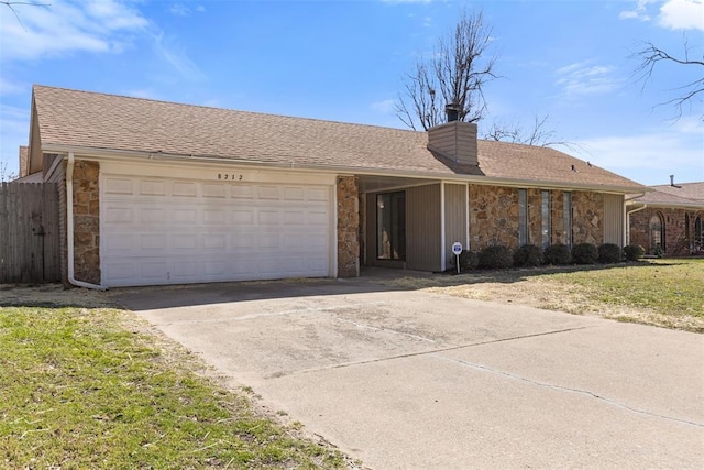 single story home featuring stone siding, a chimney, concrete driveway, and an attached garage