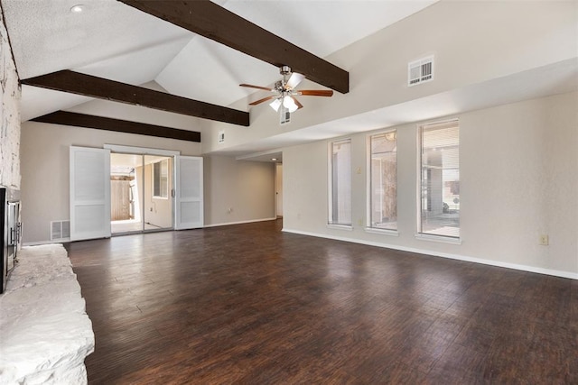 unfurnished living room featuring visible vents, baseboards, and wood finished floors