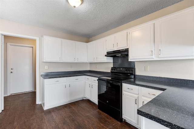 kitchen featuring under cabinet range hood, dark wood finished floors, black electric range oven, and white cabinetry