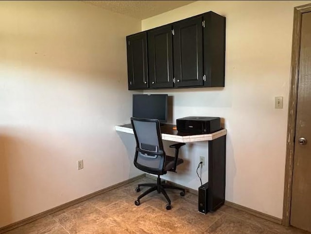 home office featuring baseboards